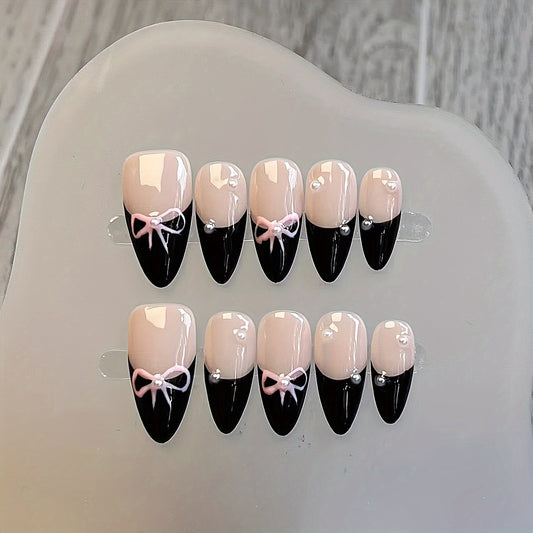10 Pcs Hand-Painted Bow Tie Decorated French Manicure Press-On Nail Tips with Pearl Accents - Black and Pink Color Scheme, Almond Shape, Medium Length Good Vibrations