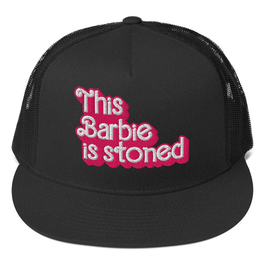 Black Barbie Trucker Cap with pink embroidered text, structured five-panel design, and snapback closure.