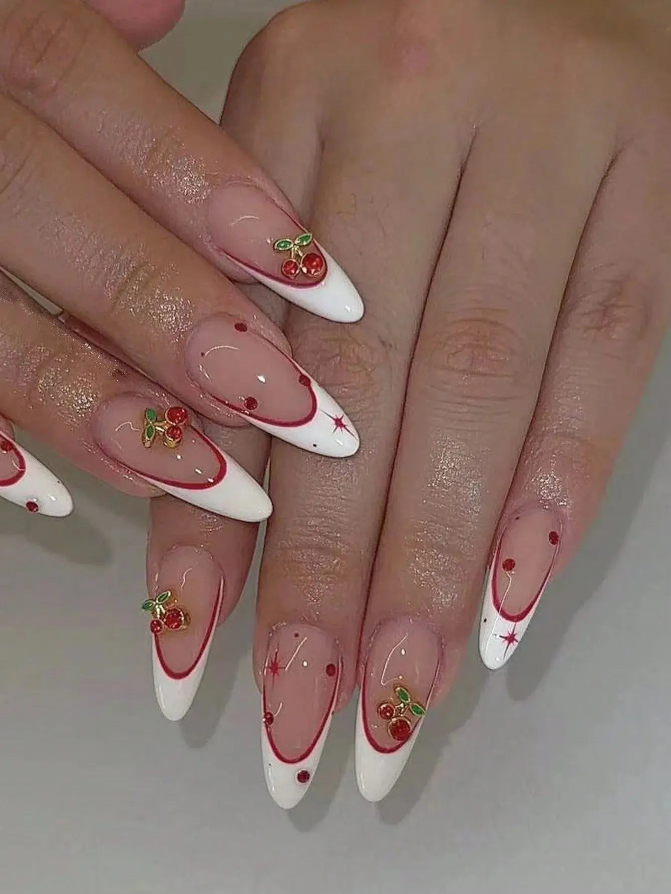 10 pieces of pure handmade almond-shaped nails, with white French tips and red cherry decorations. They are suitable for daily c Good Vibrations