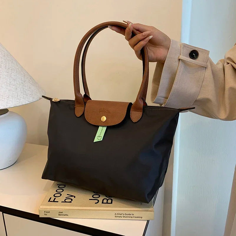 2025 Classic Commuter Handbag for Women Elegant Leather Large Capacity Business Trendy with Solid Color Paris Style Good Vibrations
