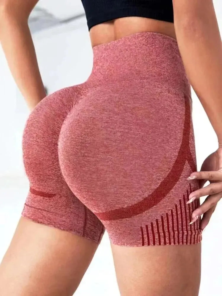 Women high-waist seamless yoga shorts in pink with herringbone knit fabric for fitness and running