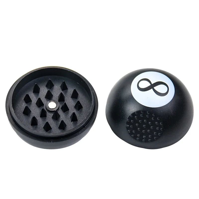 Black 8 tobacco grinder open showing sharp teeth for manual spice cutting, sleek black finish.