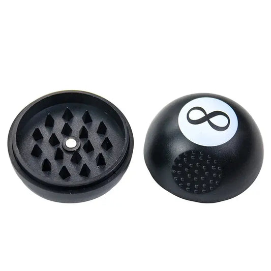 Black 8 tobacco grinder open showing sharp teeth for manual spice cutting, sleek black finish.