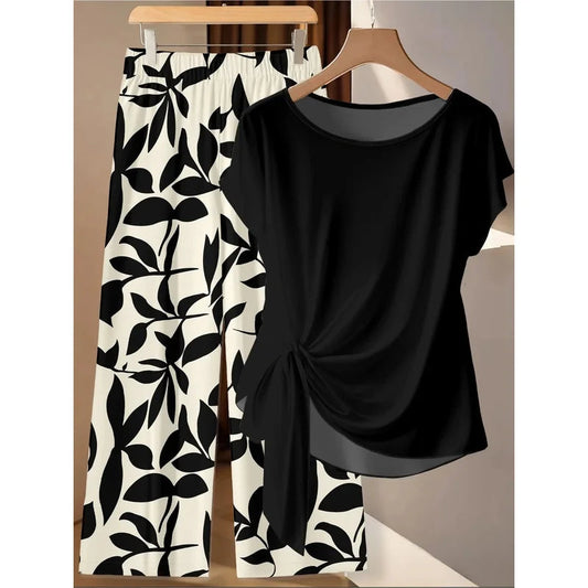 Women's plus Size Two-Piece Set Lazy Style Black Side Twisted T-Shirt And Black White Leaf Print Wide Leg Pants Casual Outfit Good Vibrations
