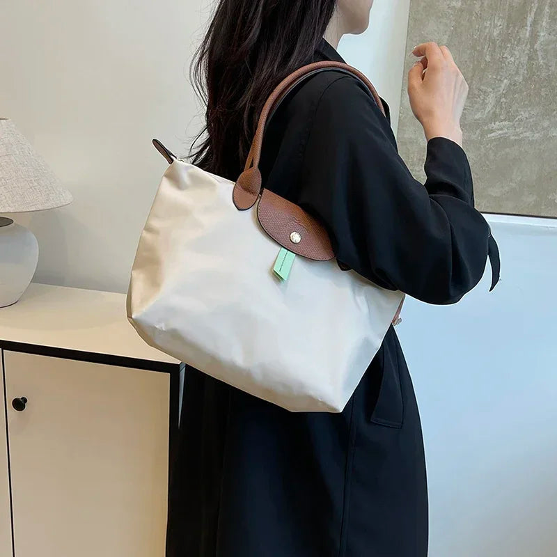 2025 Classic Commuter Handbag for Women Elegant Leather Large Capacity Business Trendy with Solid Color Paris Style Good Vibrations