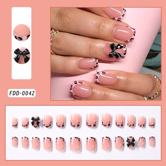 24Pcs Pink Leopard Print French Tips False Nails Short Square Head 3D Black Bowknot Fake Nails Acrylic Full Cover Press on Nails Good Vibrations