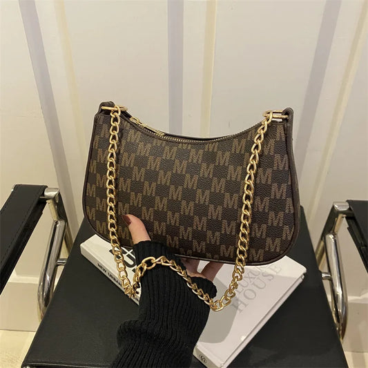 Vintage style square handbag with adjustable chain strap and letter pattern design
