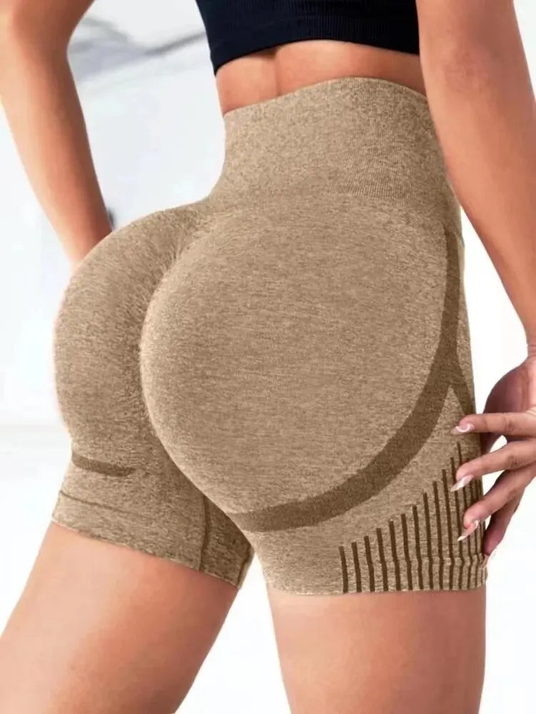 High-waist seamless women yoga shorts in beige with knitted herringbone fabric enhancing fit and comfort for workouts and running.