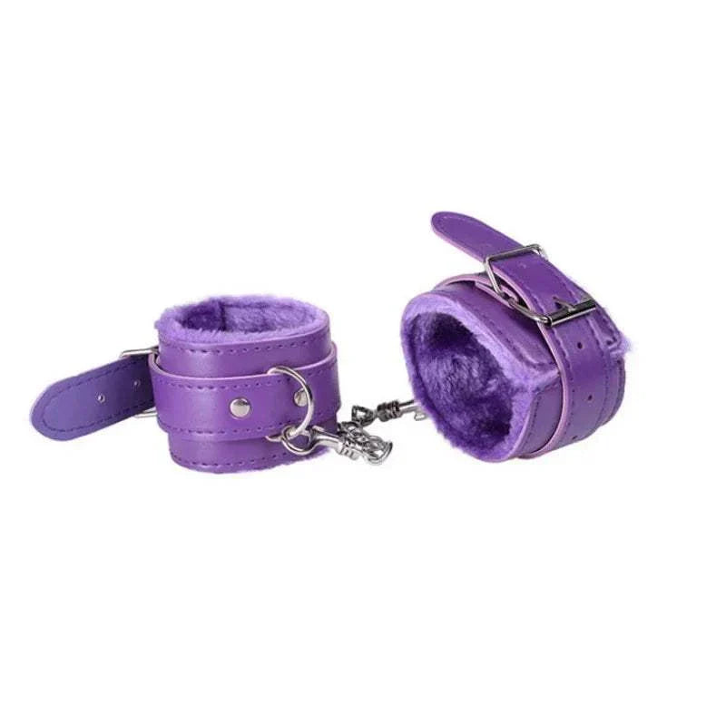 Purple soft plush BDSM handcuffs for adult bondage and restraint games.