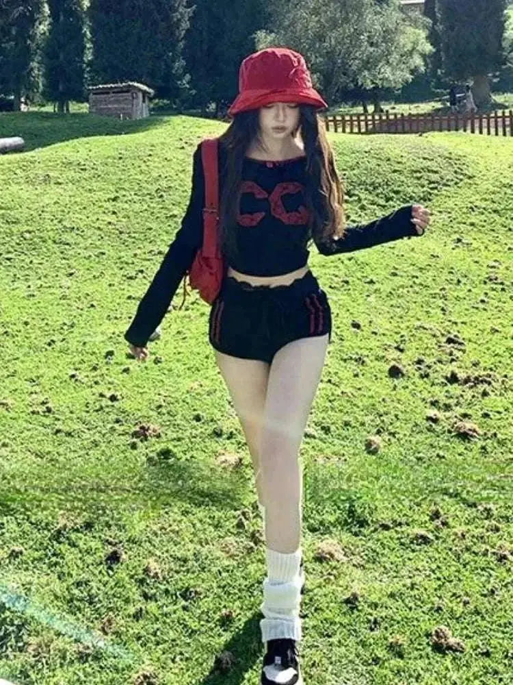 Lace patchwork two-piece set with contrast color crop T-shirt and high waist bandage shorts, casual slim grunge style.