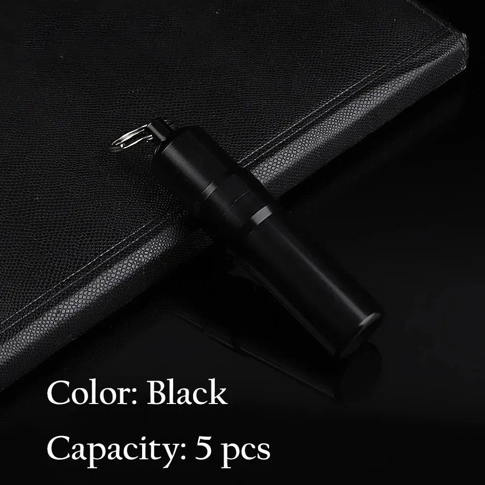 Black metal cigarette case with keychain, fits 5 cigarettes.