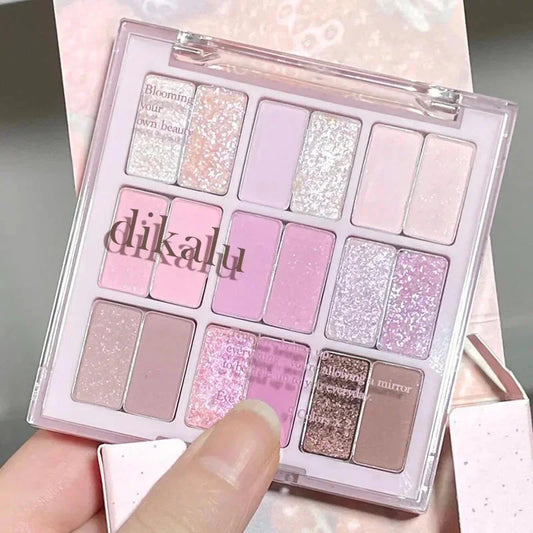 18-color pink and purple color blocking eyeshadow palette with shimmer, matte, and glitter finishes