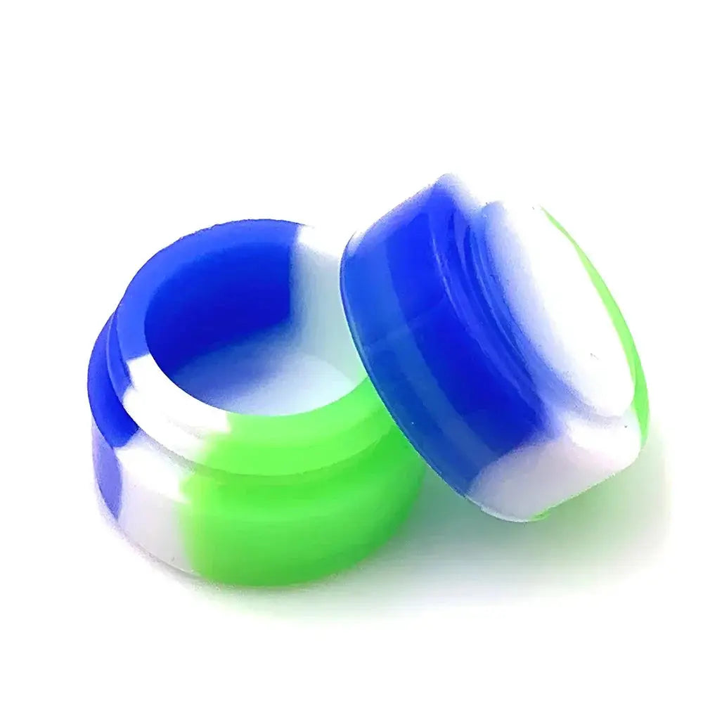 Colorful silicone containers in green, blue, and white, ideal for storing concentrates.