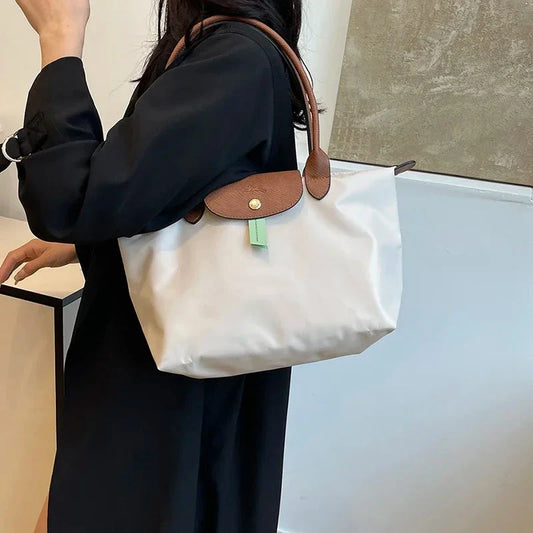 2025 Classic Commuter Handbag for Women Elegant Leather Large Capacity Business Trendy with Solid Color Paris Style Good Vibrations