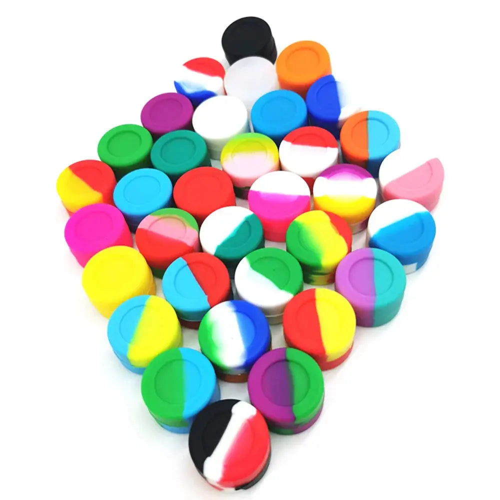 Colorful nonstick silicone containers for concentrates, oil, and wax storage.