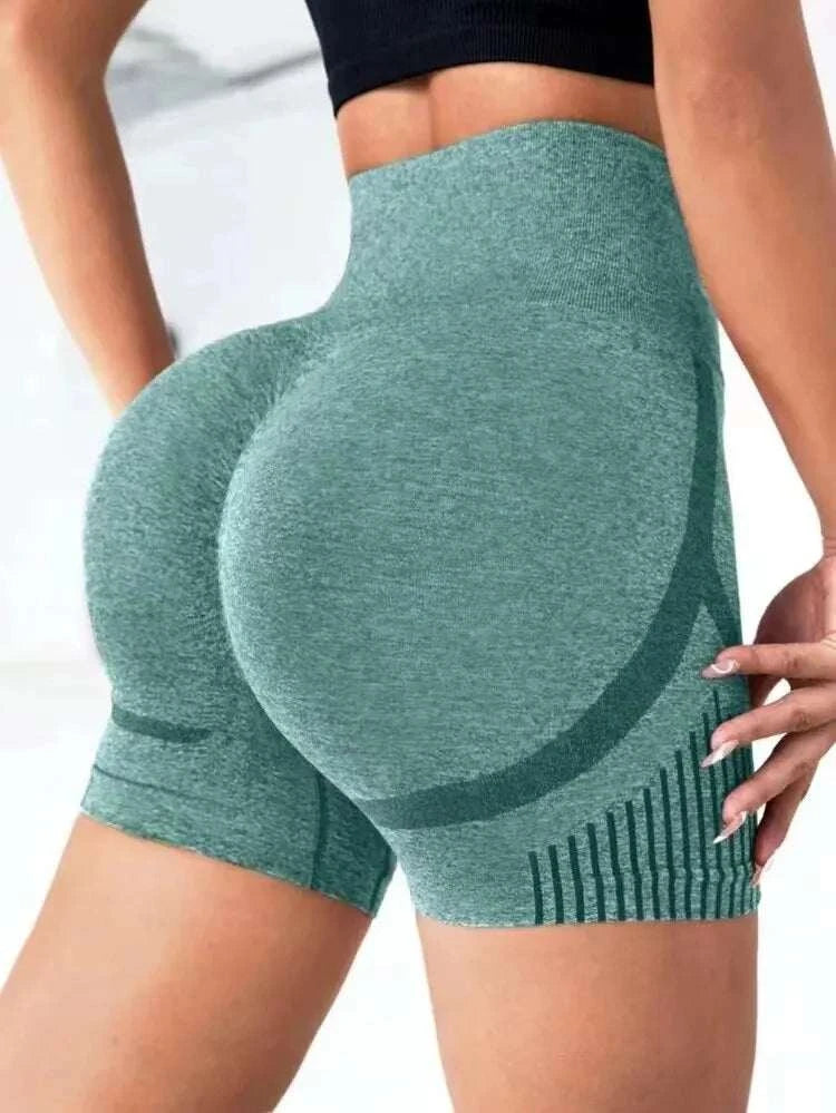 High-waist seamless women yoga shorts in green nylon blend with sculpting fit for workouts and gym activities