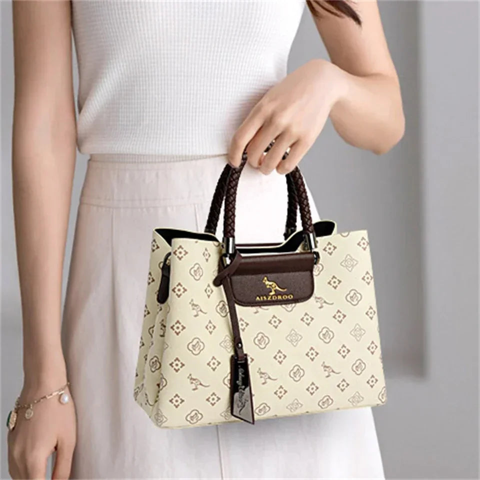 Elegant Women's Handbag Unique Handle Design Featuring a Stylish Pattern Spacious Interior  Adjustable Strap Functionality Good Vibrations
