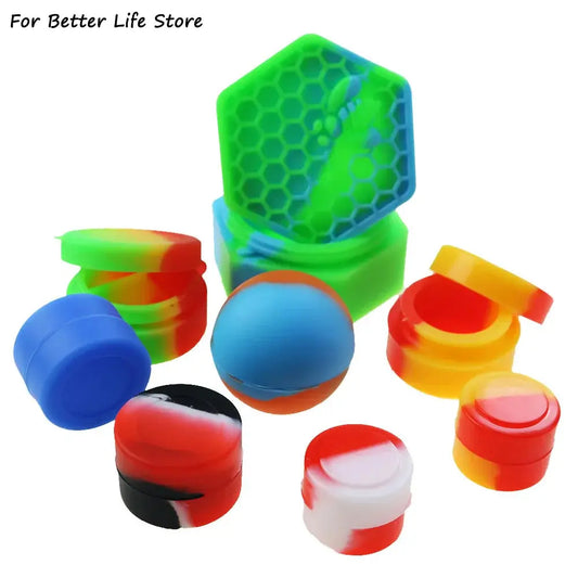 Colorful nonstick silicone containers for oil, wax, or travel essentials, available in multiple random colors and sizes.