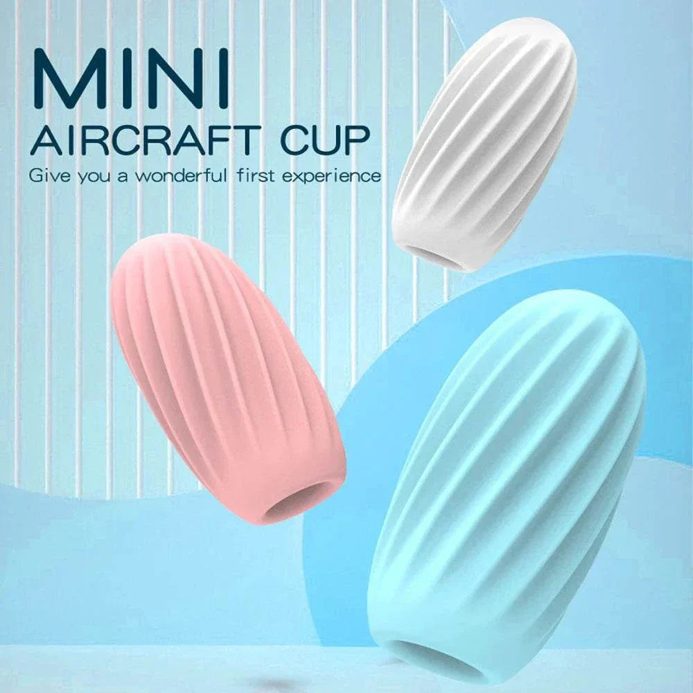 Mini Aircraft Cup in pink, blue, and white, textured male masturbator for a realistic experience.