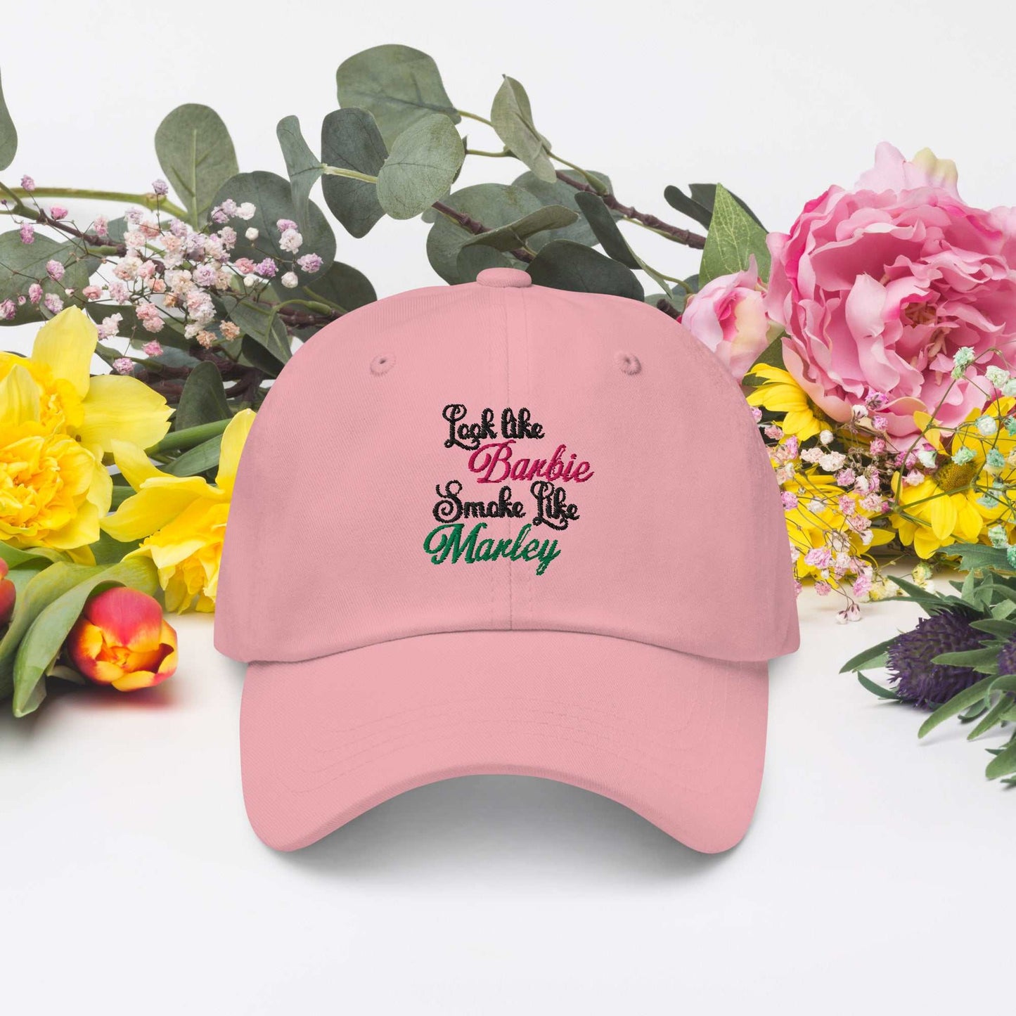 Pink Barbie Marley Hat with embroidered text and floral background.