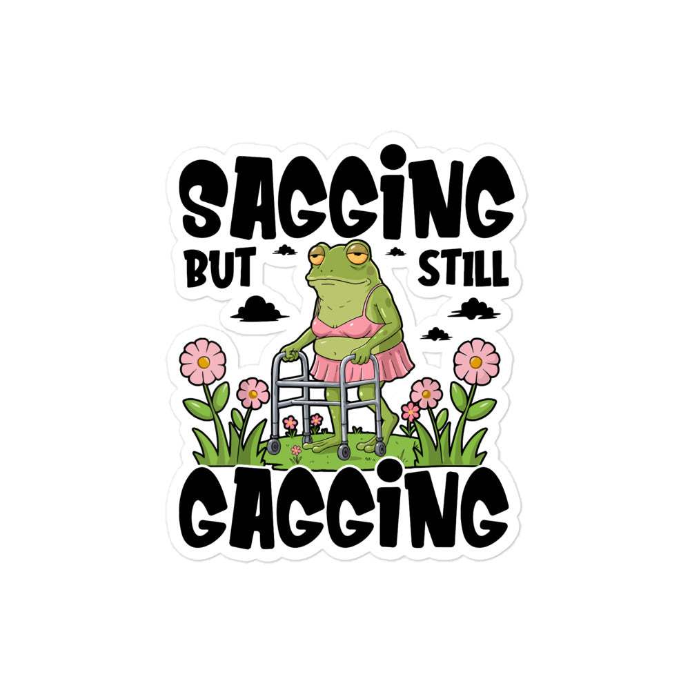 Frog-themed bubble-free sticker with "Saggin But Still Gaggin" text, durable vinyl.