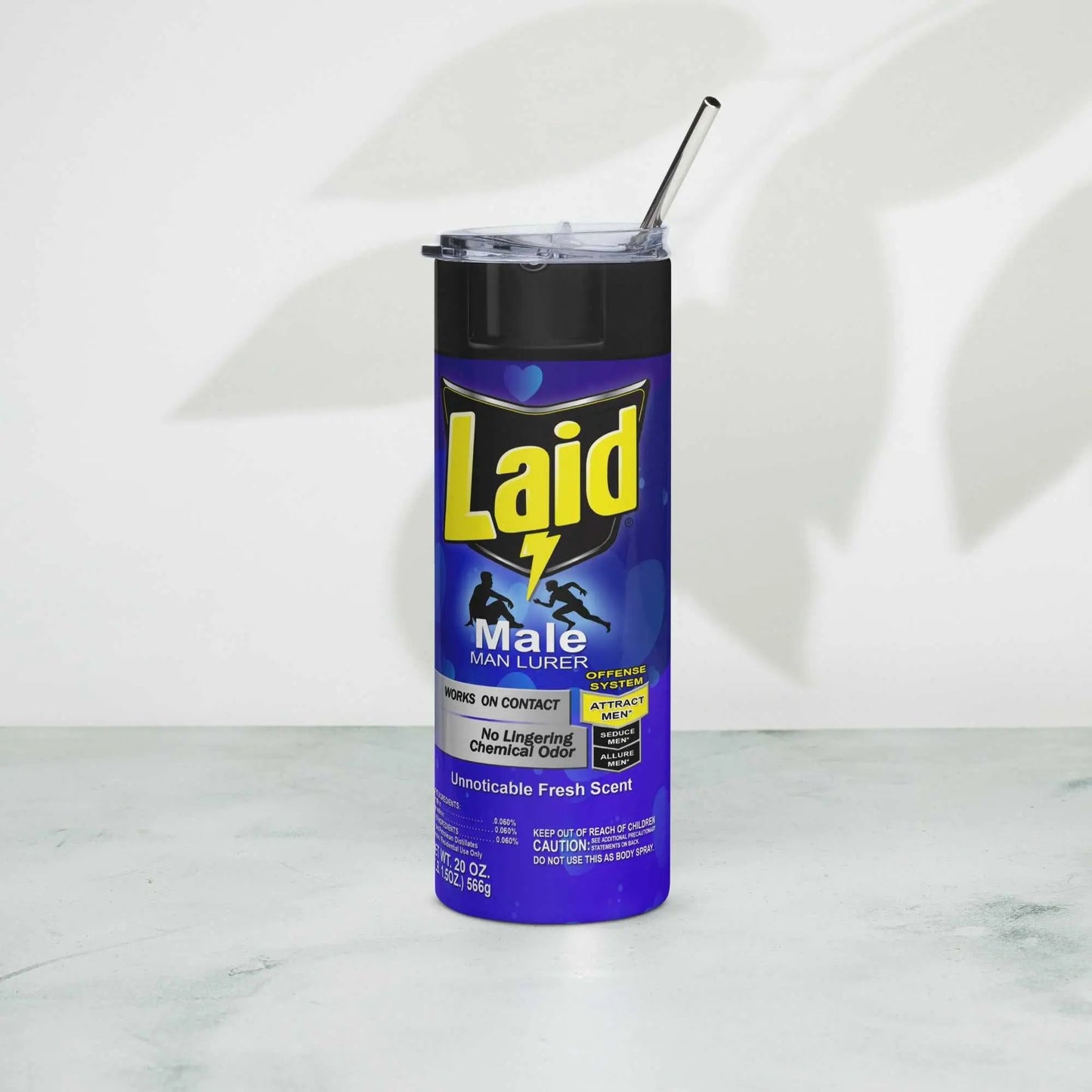 Stainless steel tumbler with "LAID" spray can design and metal straw.