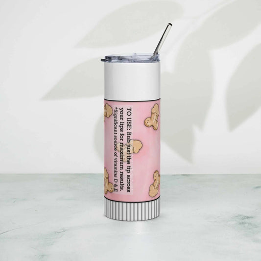 Stainless steel tumbler with metal straw and artistic design on white background.