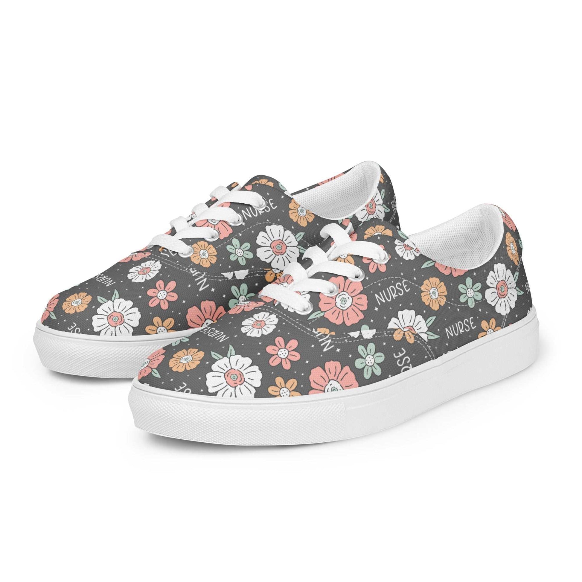 Women’s lace-up canvas shoes with floral patterns and "NURSE" text on a gray background, featuring white soles and laces.