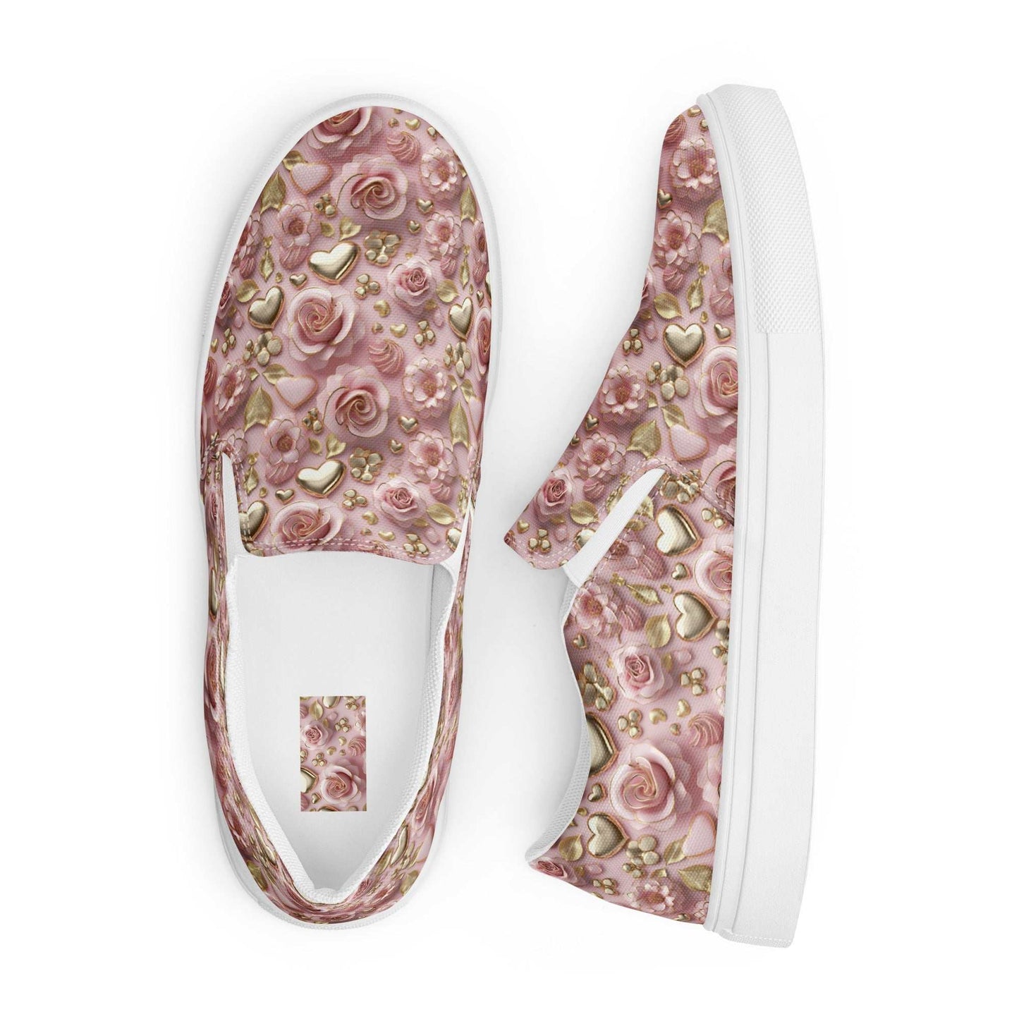 Women’s slip-on canvas shoes with pink floral and gold heart pattern, elastic side accents, and white rubber outsole.