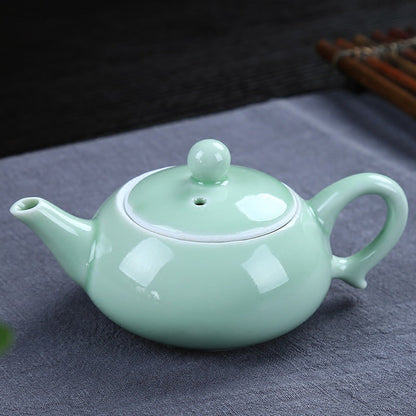 Dehua celadon kung fu tea set, carp pattern ceramic teapot set, a complete set of tea gifts, business event gift set, portable tea set gift box. Good Vibrations