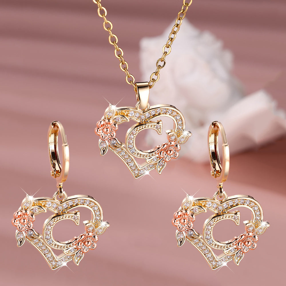 3pcs Women's Jewelry Set - Heart-Shaped Interlocking Link Necklace & Earrings with 26-Letter Monogram, Elegant Golden-Tone -Accented Letters, Dainty Everyday Gift for Mother's Day, Graduation, Birthdays (Pink & Clear Good Vibrations