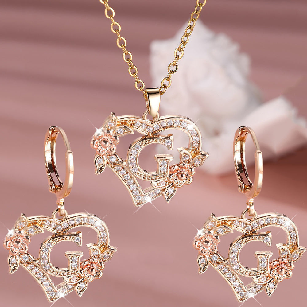 3pcs Women's Jewelry Set - Heart-Shaped Interlocking Link Necklace & Earrings with 26-Letter Monogram, Elegant Golden-Tone -Accented Letters, Dainty Everyday Gift for Mother's Day, Graduation, Birthdays (Pink & Clear Good Vibrations