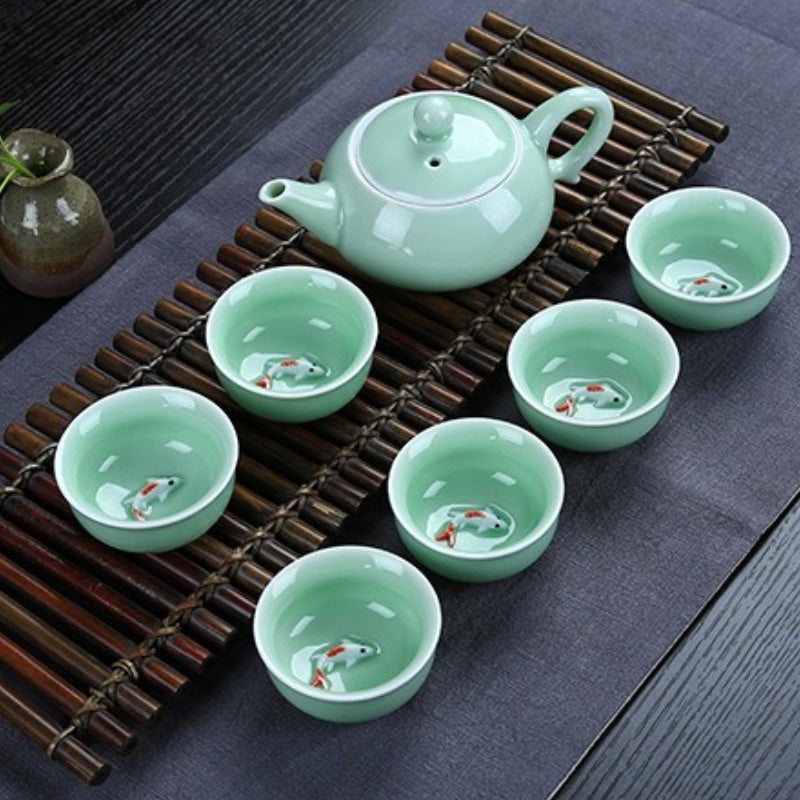 Dehua celadon kung fu tea set, carp pattern ceramic teapot set, a complete set of tea gifts, business event gift set, portable tea set gift box. Good Vibrations