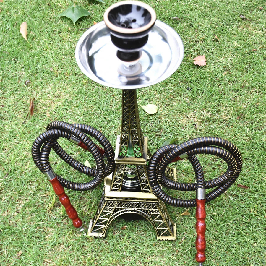 Paris Tower Shisha Hookah with double hose and ceramics bowl on grass.