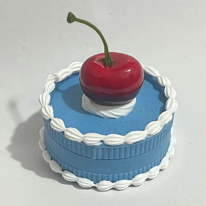 55mm cake-shaped acrylic herb grinder with cherry motif for spices and tobacco milling.