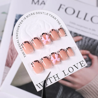 24Pcs Pink Leopard Print French Tips False Nails Short Square Head 3D Black Bowknot Fake Nails Acrylic Full Cover Press on Nails Good Vibrations