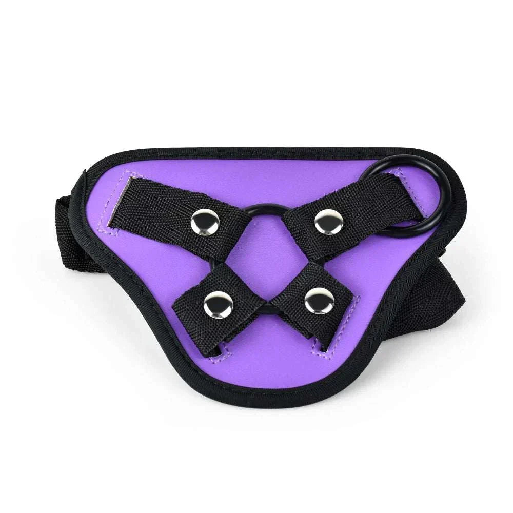 Purple adjustable strap-on harness for bondage with sturdy design and adjustable straps.