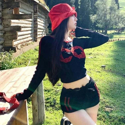 Lace patchwork crop t-shirt and high waist bandage shorts in grunge style for women, autumn casual outfit.