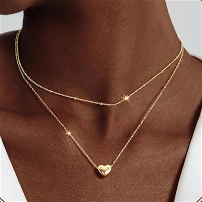 Simple Elegant Cross Bow Necklace for Women Attractive Motifs Golden Alloy Layered Necklace Party Jewellery Accessories Good Vibrations