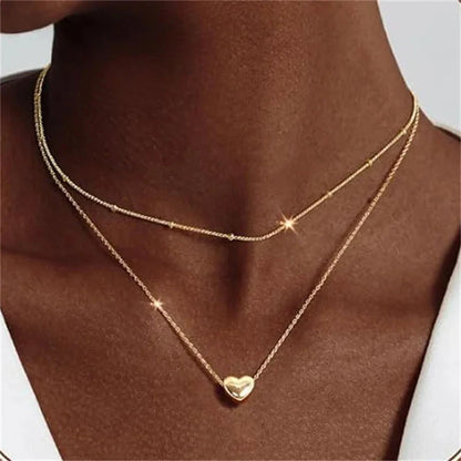 Simple Elegant Cross Bow Necklace for Women Attractive Motifs Golden Alloy Layered Necklace Party Jewellery Accessories Good Vibrations
