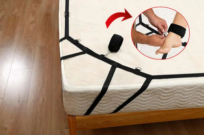 BDSM bed restraint system with nylon handcuffs and ankle cuffs for couples games.