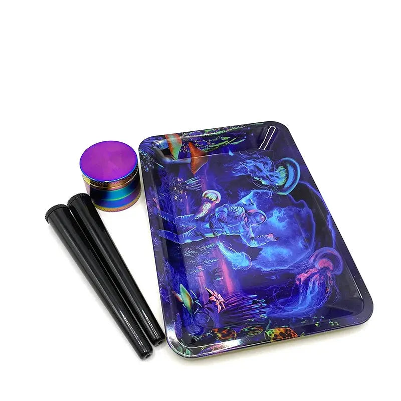 Metal herb grinder set with smell-proof storage tube and a vibrant rolling tray.