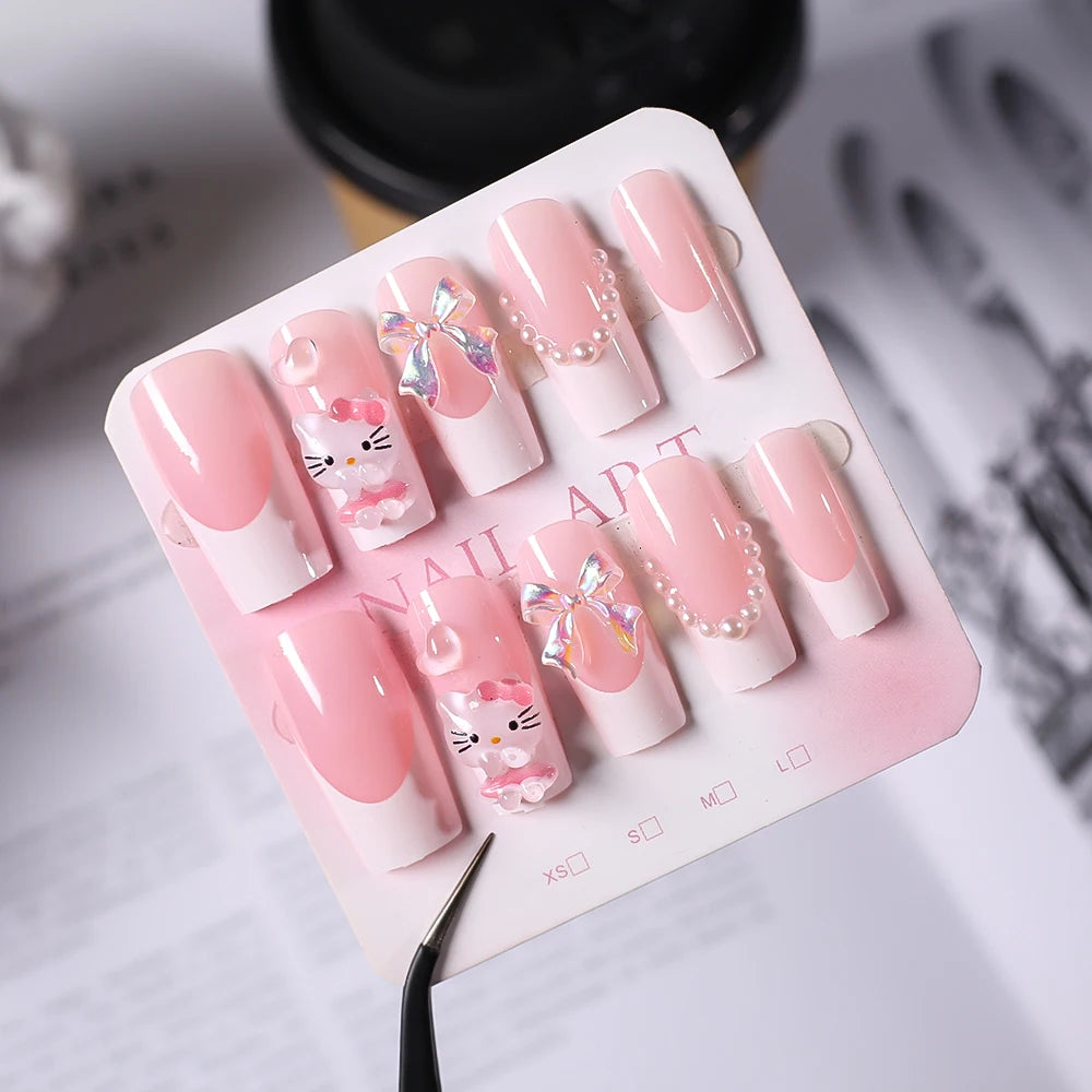Pink French Fake Nails 3D Pink Hello Kitty, Aurora Bow, Pearl Design False Nail Medium Coffin Shaped Full Cover Press On Nails Good Vibrations
