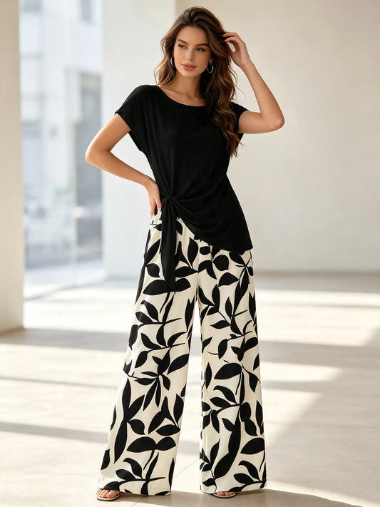 Women's plus Size Two-Piece Set Lazy Style Black Side Twisted T-Shirt And Black White Leaf Print Wide Leg Pants Casual Outfit Good Vibrations