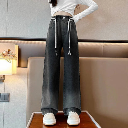 New 2024 Teenage Girls Blue Street Cartoon Print Elastic Mid Waist Loose Denim Jeans Spring Fashion Children Cute Wide Leg Pants Good Vibrations