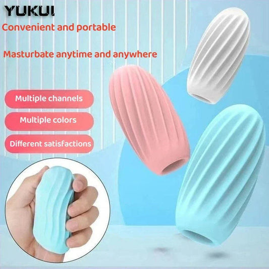 Soft textured male stroker toy in multiple colors, ideal for discreet and portable use.