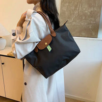 2025 Classic Commuter Handbag for Women Elegant Leather Large Capacity Business Trendy with Solid Color Paris Style Good Vibrations