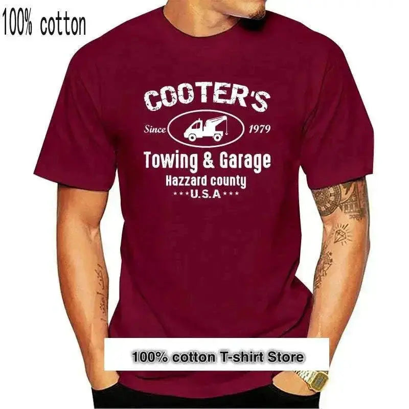 Men's t-shirt with "Cooter's Towing & Garage" print, 100% cotton, casual style.