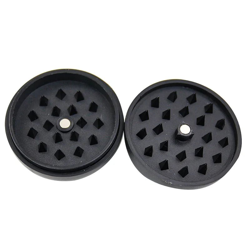 Creative Black 8 Tobacco Grinder for herbs and spices, made from plastic and metal.