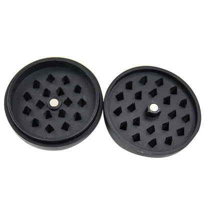 Creative Black 8 Tobacco Grinder for herbs and spices, made from plastic and metal.
